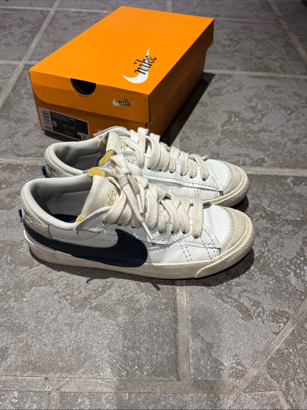 Nike White Leather Sneakers with Navy Swoosh